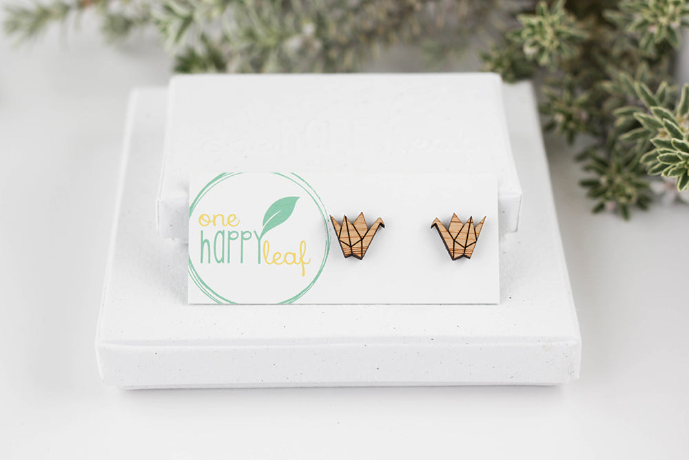 These cute origami crane stud earrings are approximately 0.4 inches (1 cm) by 0.5 inches (1.2 cm) in length on surgical steel studs (to protect sensitive ears)